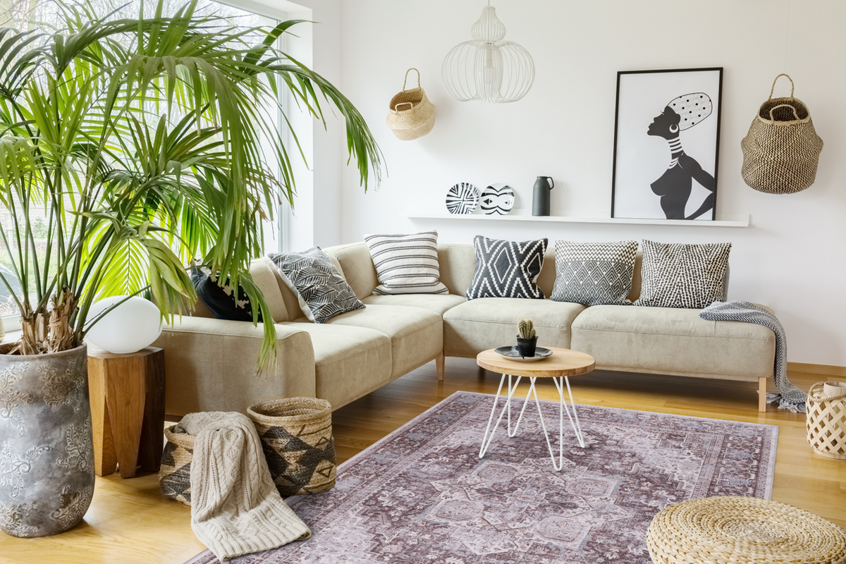 Multicolor geometric washable rug by Netline Home featuring tribal patterns, vibrant design, and durable fabric for versatile decor.
