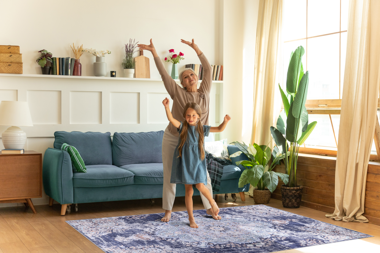 Traditional blue abstract medallion washable rug by Netline Home, featuring intricate medallion pattern and vibrant design.