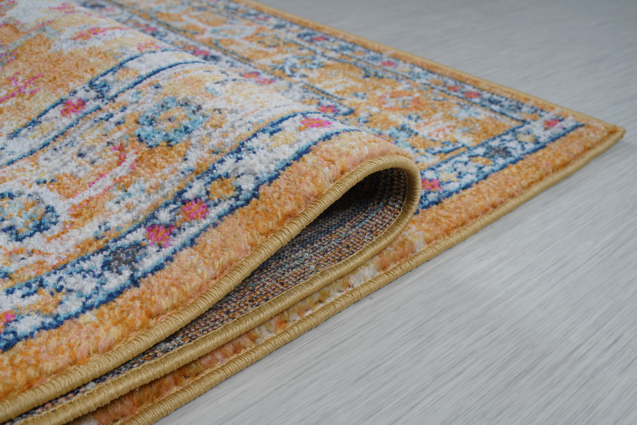 Vintage Netline Home area rug with mustard and rust bohemian pattern, featuring intricate designs and warm earthy tones.