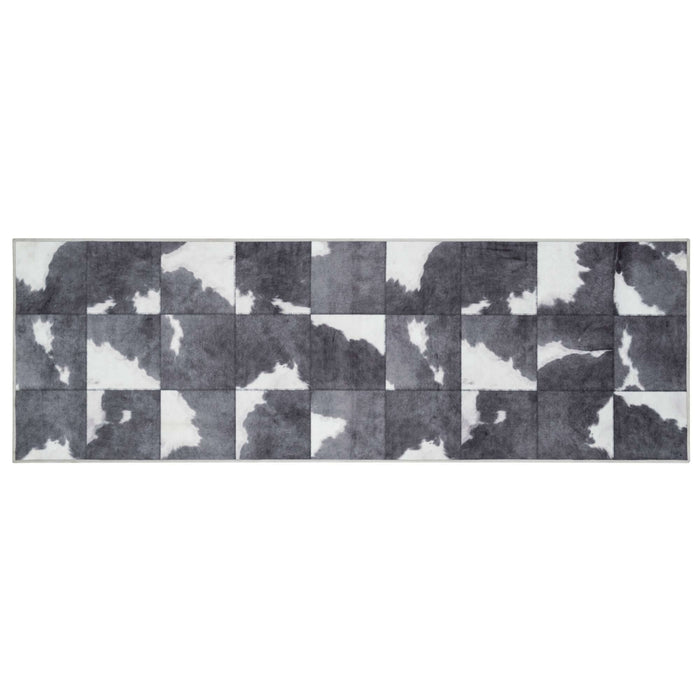 Faux Hides Rug Black and White shown in an illustrative room