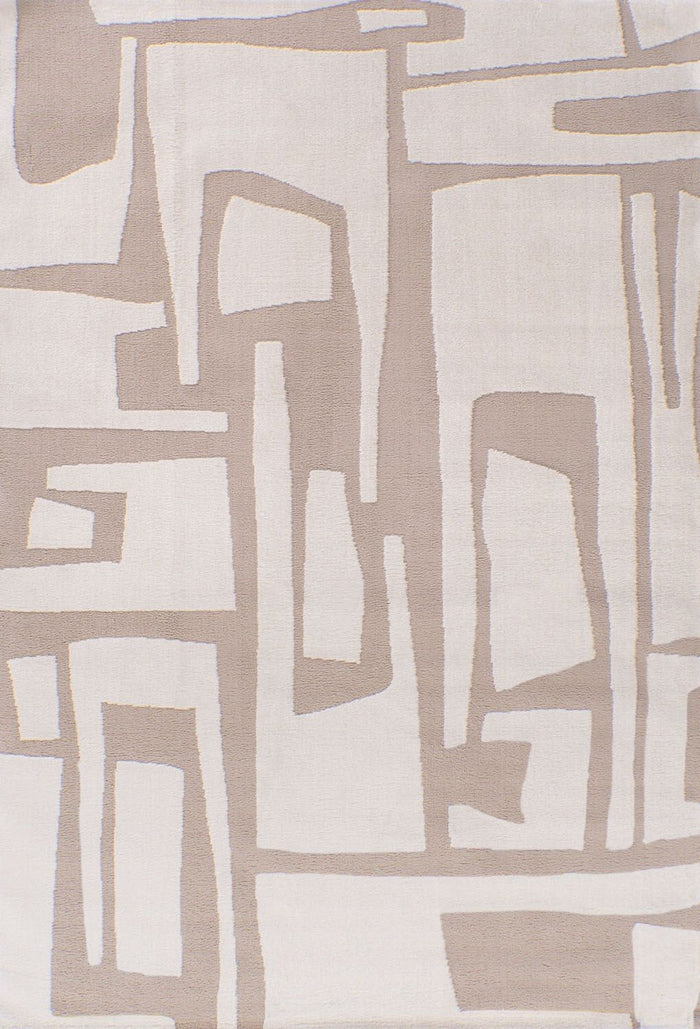 Loft Abstract Beige Rug shown in an illustrative room