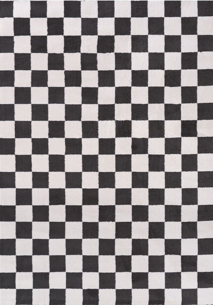 Loft Checkerboard Dark Grey Rug shown in an illustrative room