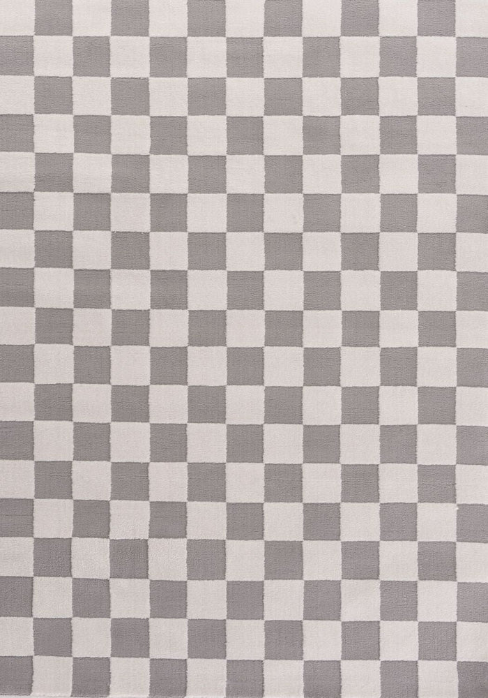 Loft Checkerboard Grey Rug shown in an illustrative room