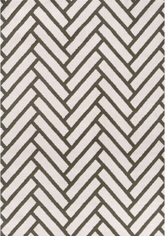 Loft Chevron Green Rug shown in an illustrative room