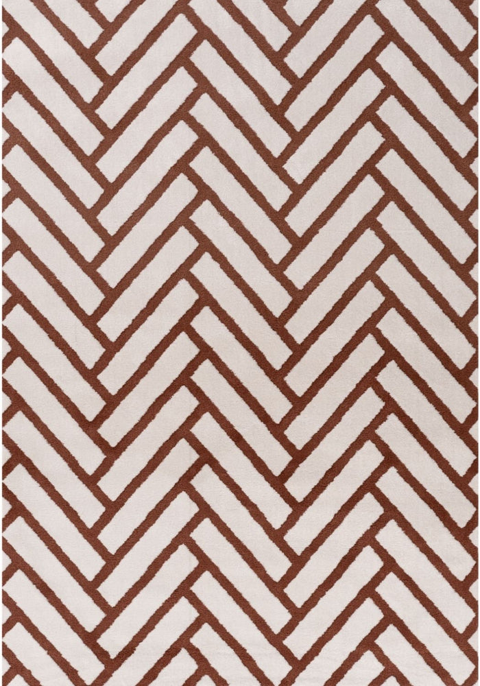 Loft Chevron Terra Rug shown in an illustrative room