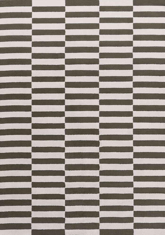 Loft Striped Green Rug shown in an illustrative room