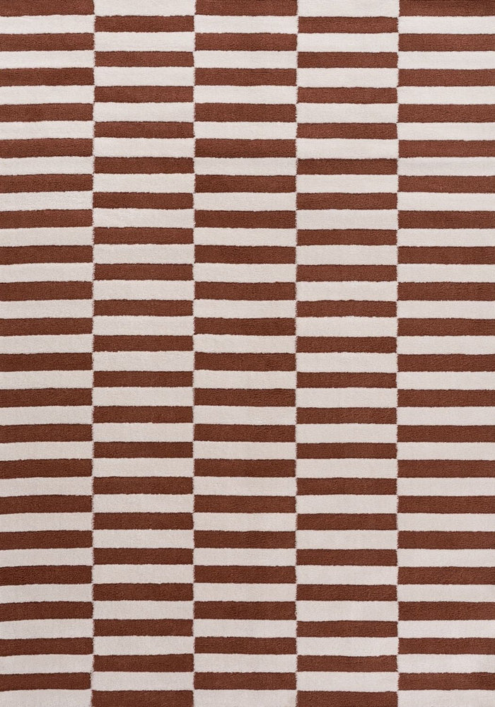 Loft Striped Terra Rug shown in an illustrative room