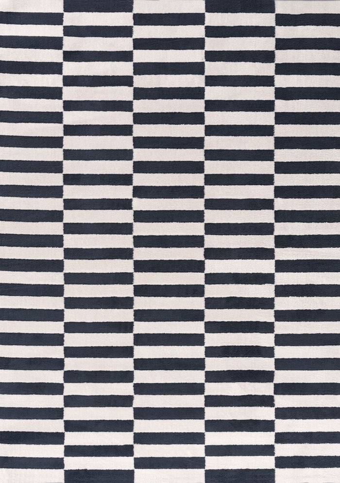 Loft Striped Blue Rug shown in an illustrative room