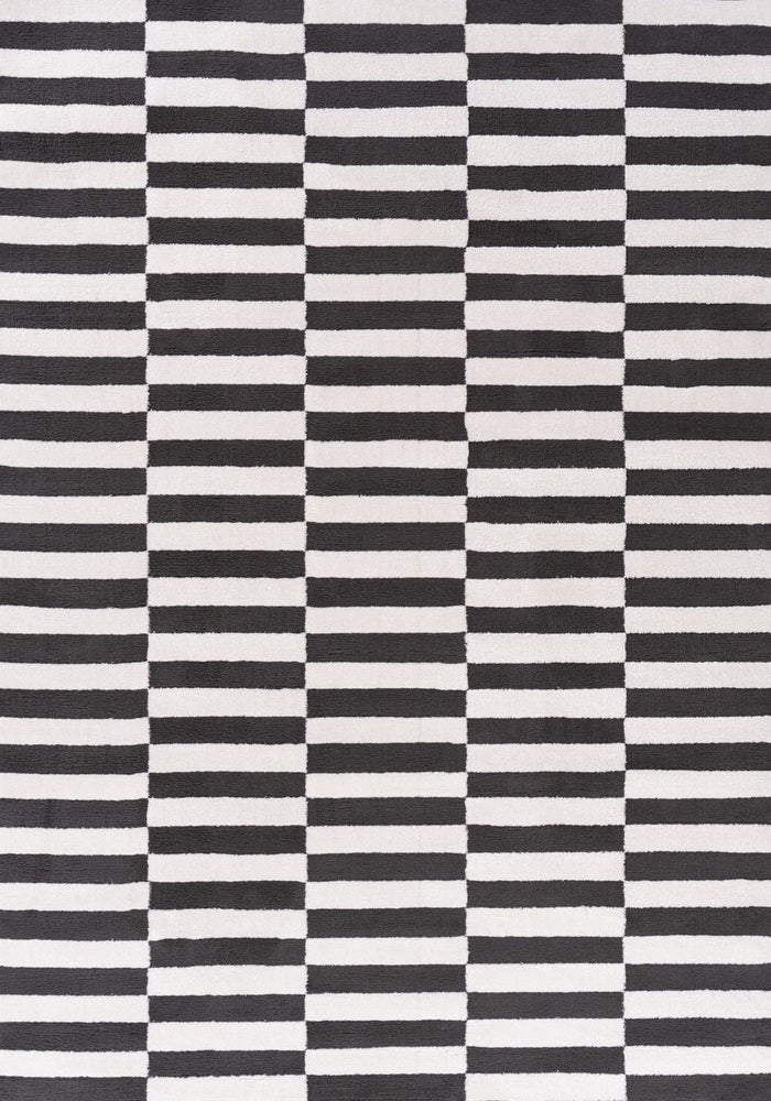 Loft Striped Dark Grey Rug shown in an illustrative room