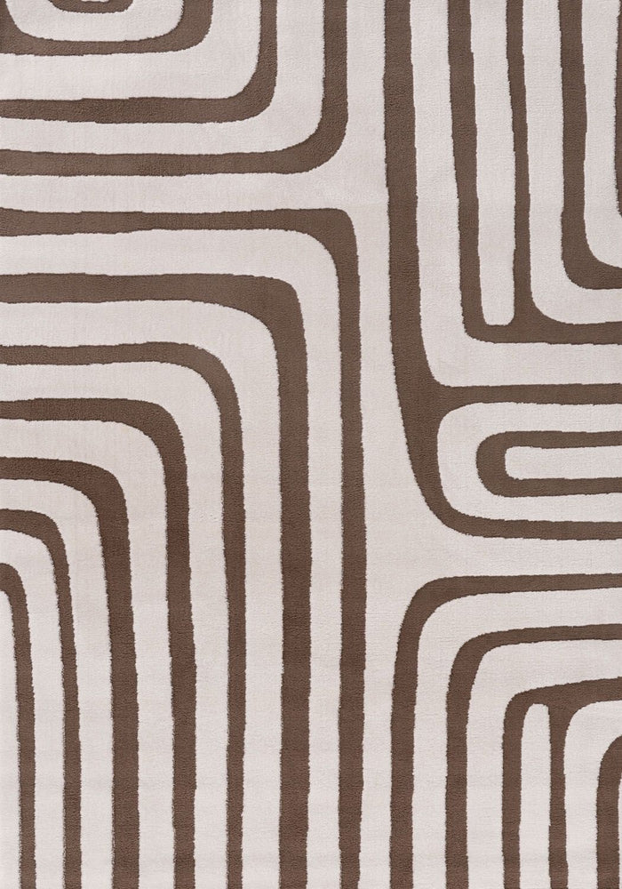 Loft Geometric Brown Rug shown in an illustrative room