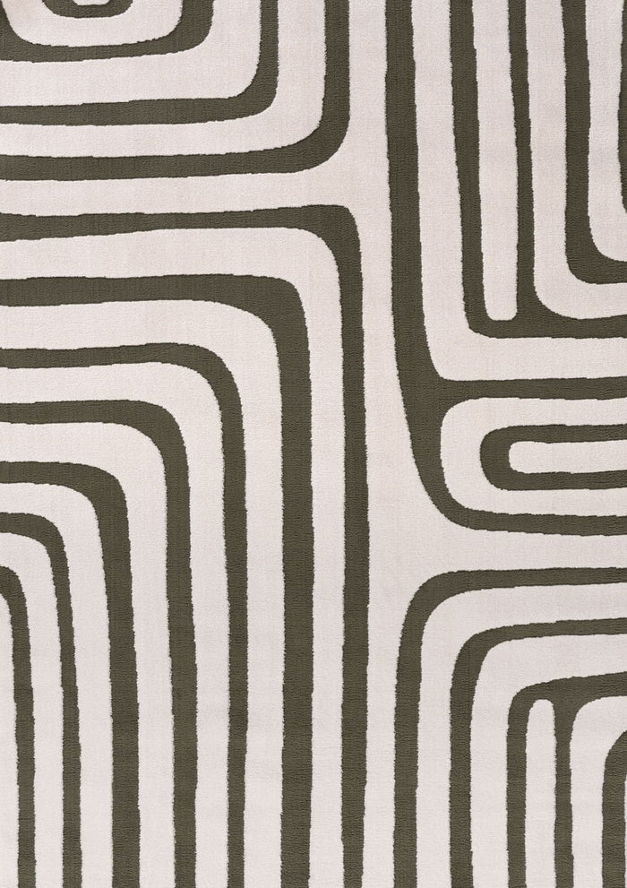 Loft Geometric Green Rug shown in an illustrative room