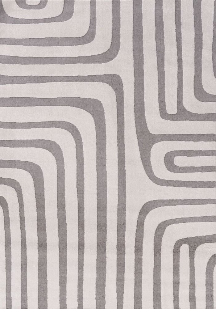 Loft Geometric Grey Rug shown in an illustrative room