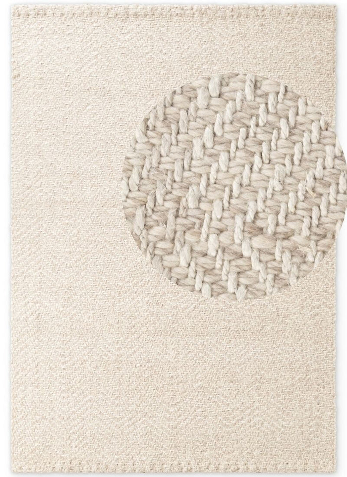 Majoli Natural White Herringbone Wool & Jute Rug shown in an illustrative room