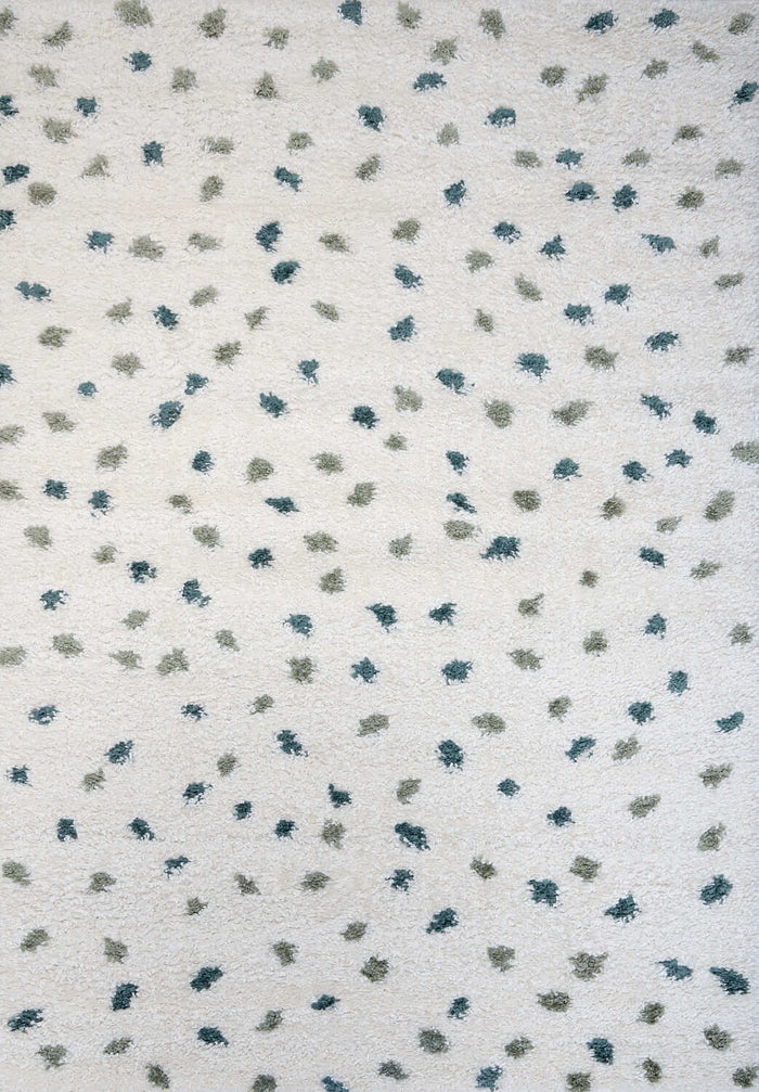 Moodi Shaggy Green Drizzle Rug shown in an illustrative room