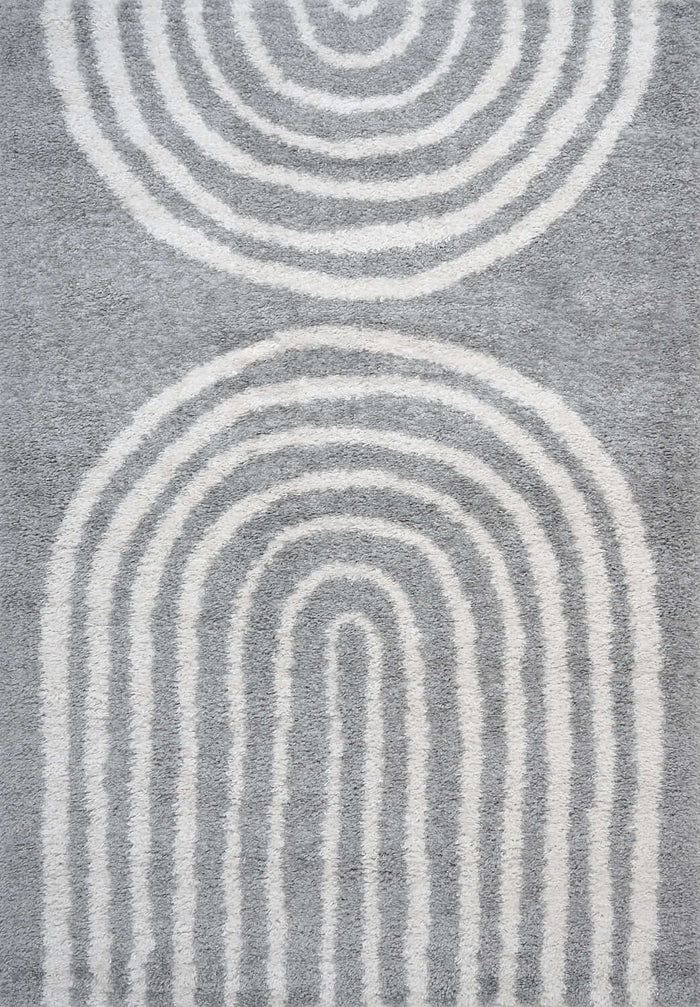 Moodi Shaggy Grey Echo Rug shown in an illustrative room