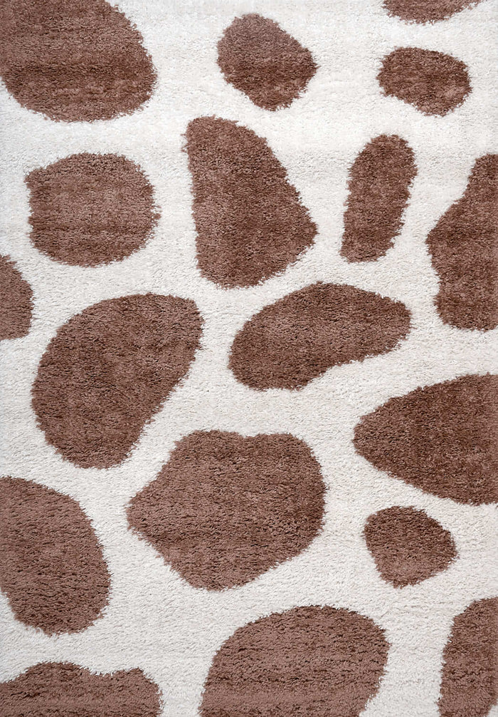 Moodi Shaggy Terra Froth Rug shown in an illustrative room