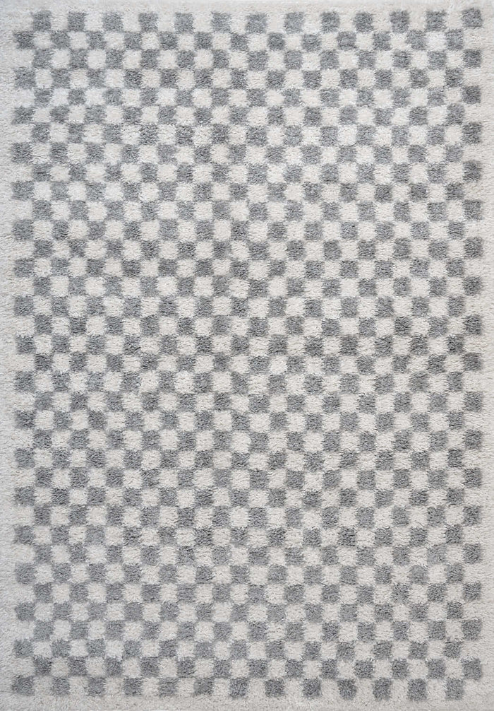 Moodi Shaggy Grey Mulberry Rug shown in an illustrative room