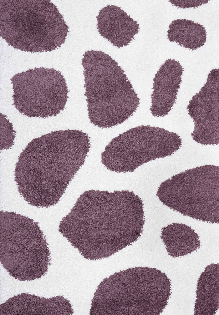Moodi Shaggy Purple Nimbus Rug shown in an illustrative room