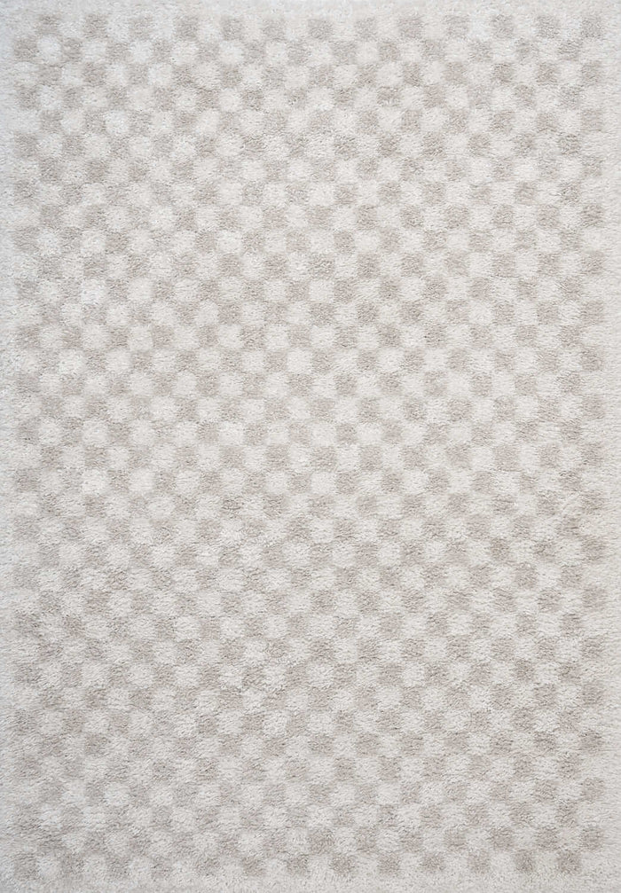 Moodi Shaggy Light Beige Nomari Rug shown in an illustrative room