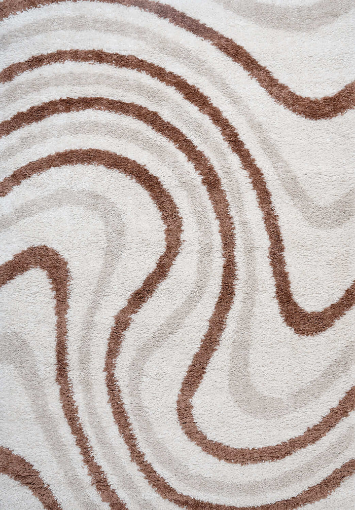 Moodi Shaggy Cream/Terra Sunhaze Rug shown in an illustrative room