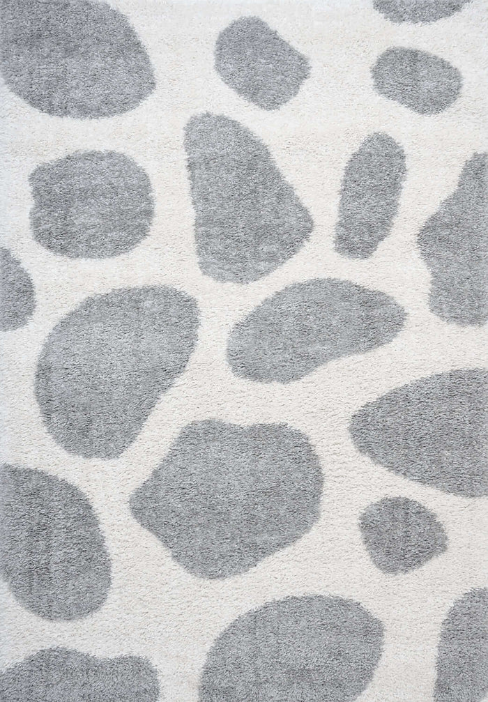 Moodi Shaggy Grey Tarn Rug shown in an illustrative room