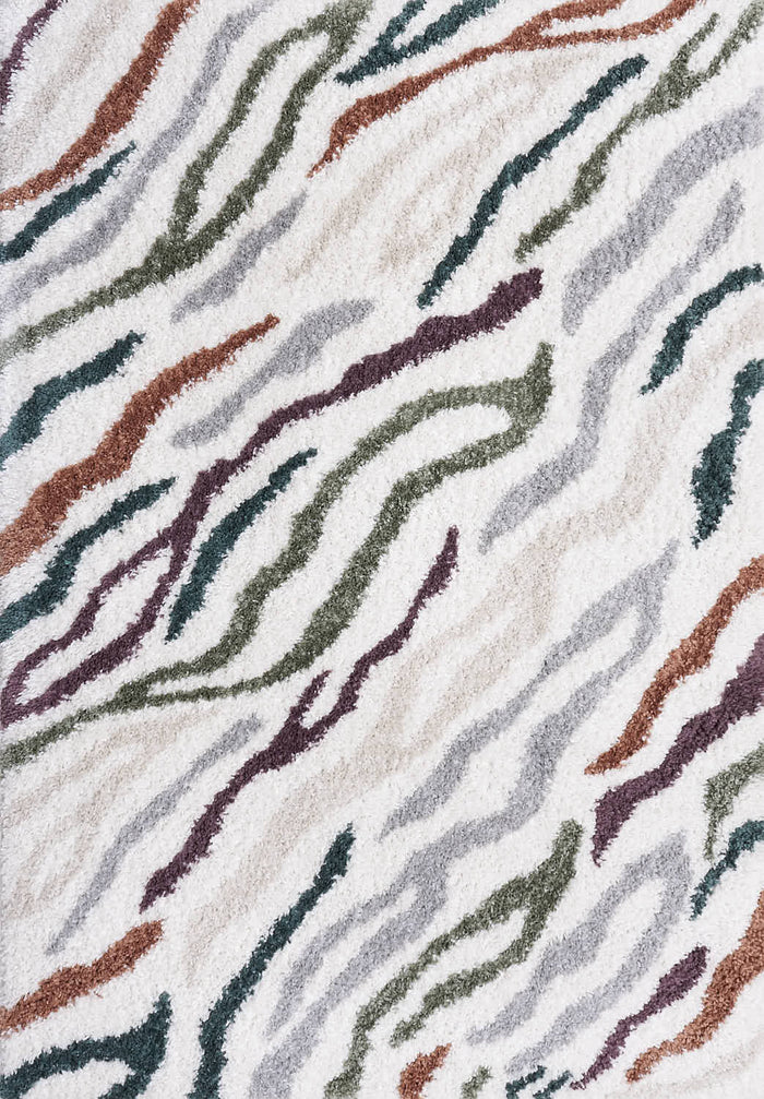 Moodi Shaggy Multicolour Tidecrest Rug shown in an illustrative room