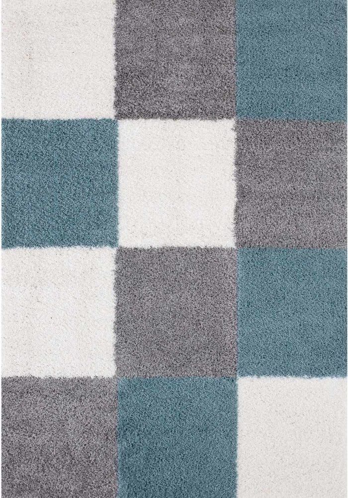 Myshaggy Geometric Duck Egg Blue Rug shown in an illustrative room