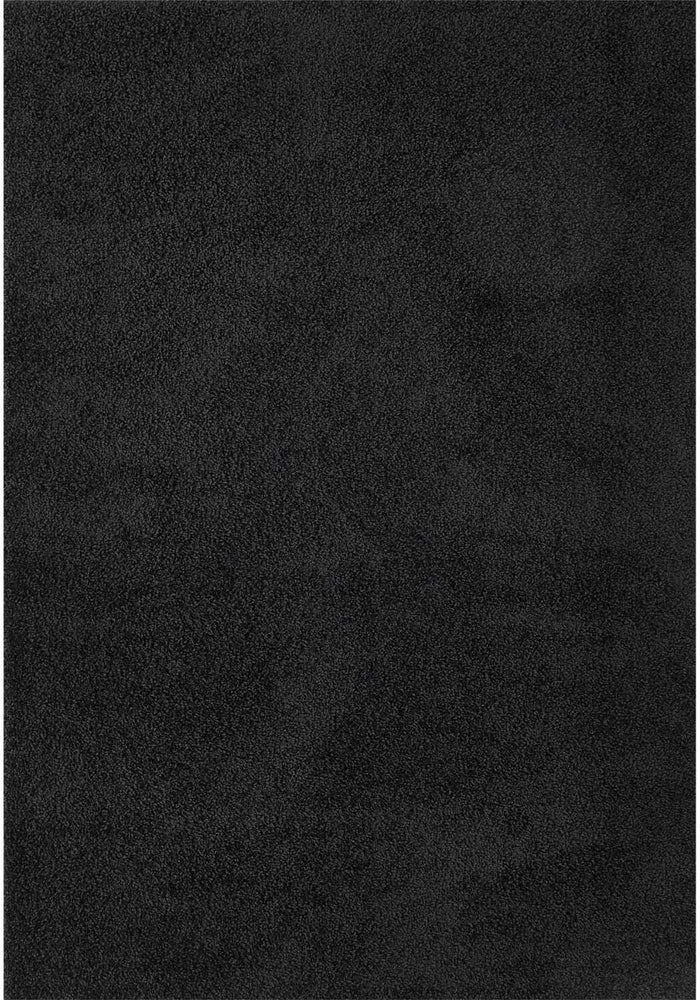 Myshaggy Solid Black Rug shown in an illustrative room