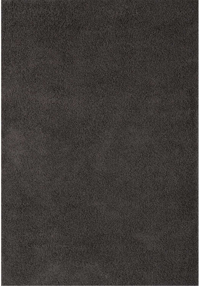 Myshaggy Solid Dark Grey Rug shown in an illustrative room