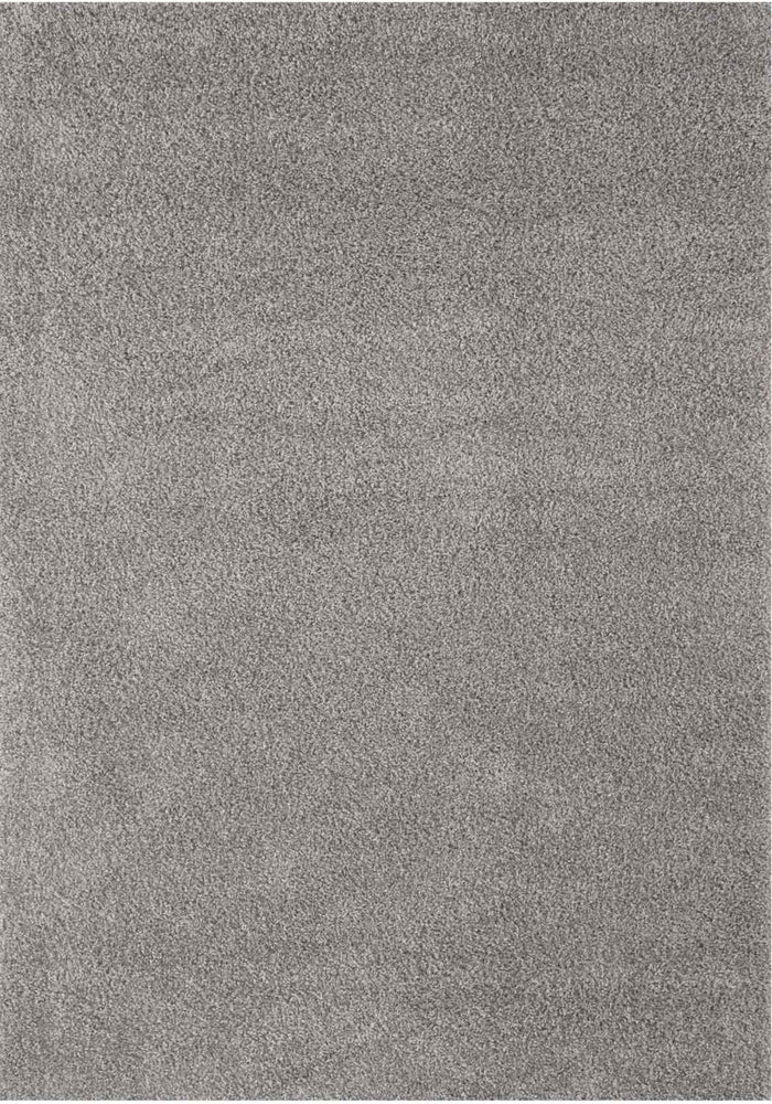 Myshaggy Solid Grey Rug shown in an illustrative room