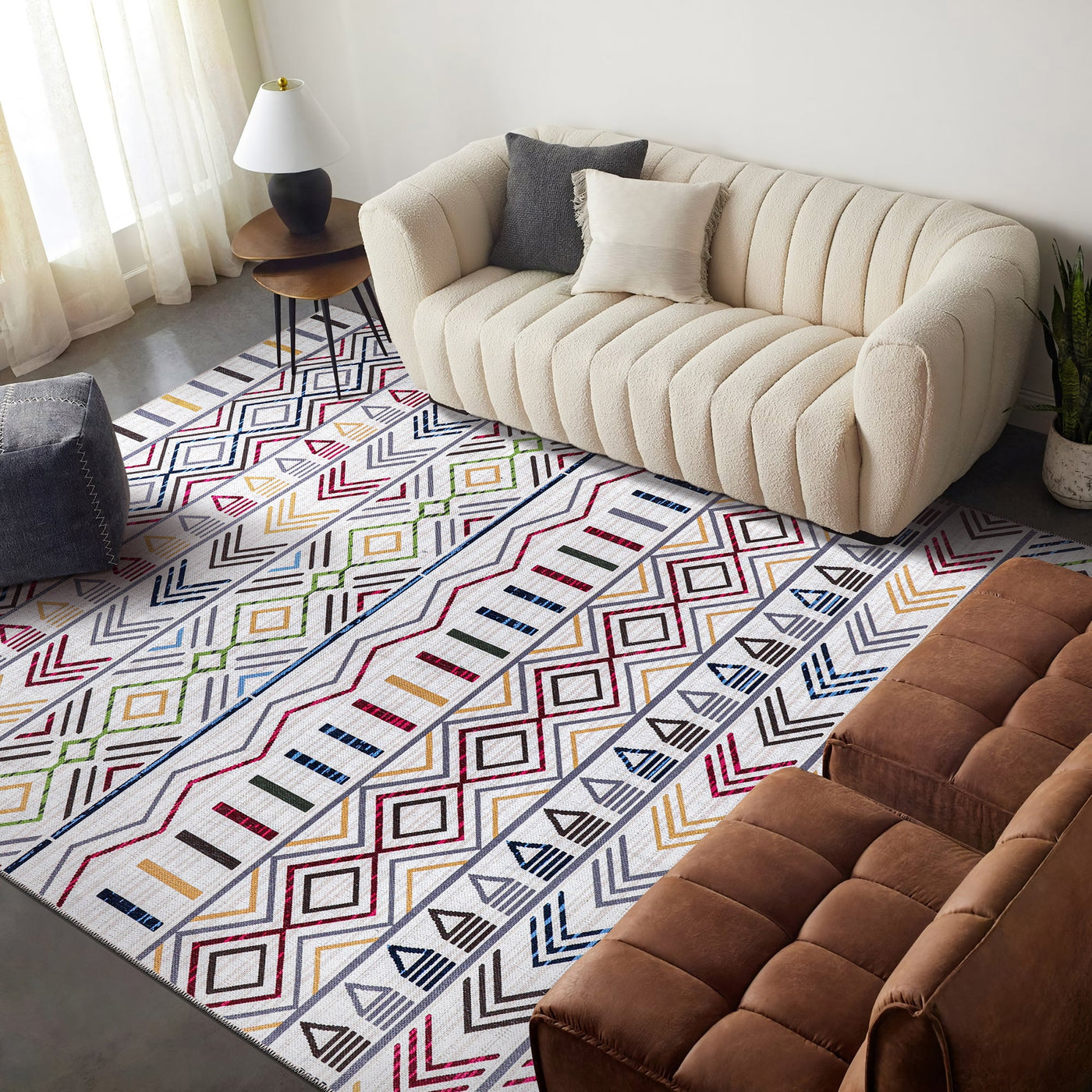 Red medallion washable kilim rug by Netline Home with intricate patterns, visible in the image.