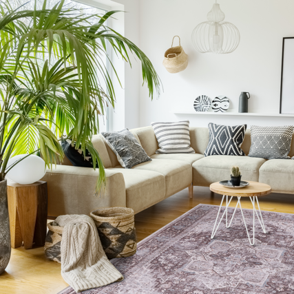 Offset Watercolour Mauve Grey Abstract Washable Rug shown in an illustrative room