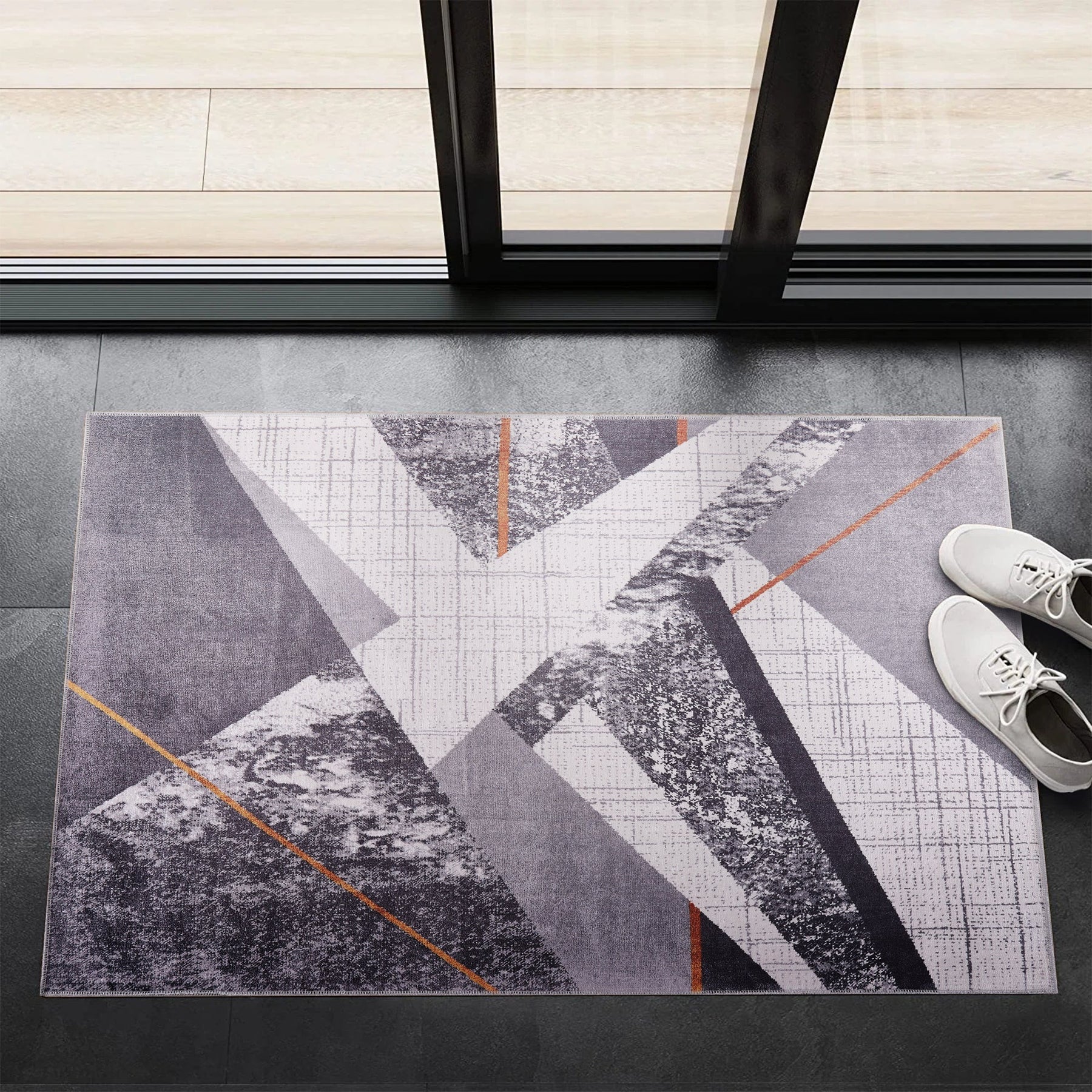 Gray bohemian striped washable rug from Netline Home, featuring a stylish pattern and soft texture, suitable for modern interior decor.