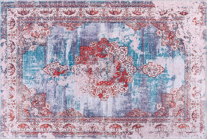 Painted Medallion Indigo Blue Traditional Washable Rug shown in an illustrative room