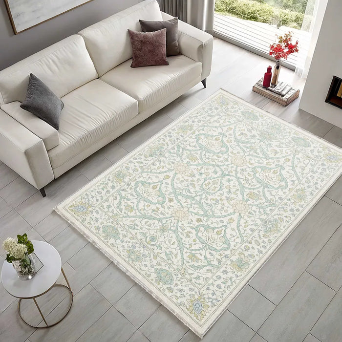 Collected Border Muted Green Floral Washable Rug shown in an illustrative room