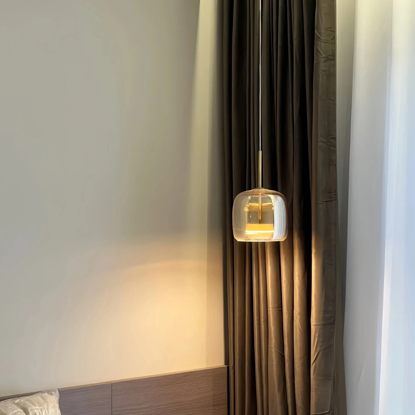 Black and gold pendant lamp with LED warm light, adjustable height, modern design, from Light My House.