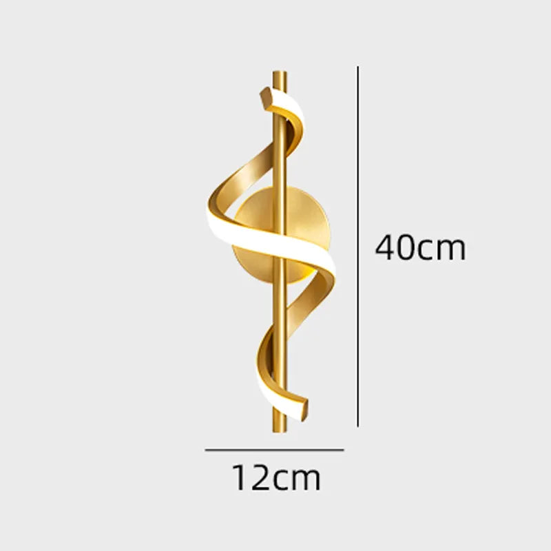 Black and gold Twisted LED wall light from Light My House, modern design for living room decor, mounted on a wall.