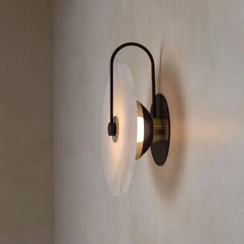Modern marble wall lamp with disc texture and warm LED light, ideal for stylish home decor by Light My House.