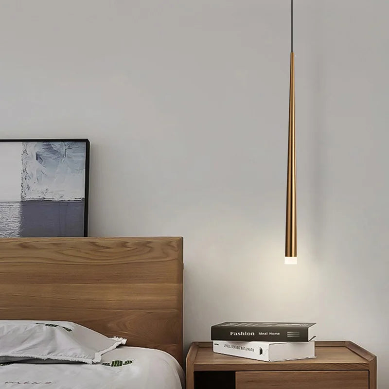 Sleek Drop Pendant Light by Light My House with LED, adjustable height, warm light, and modern design hanging from the ceiling