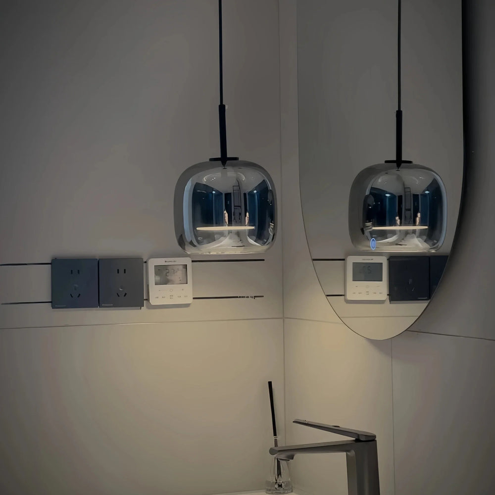 Black gold pendant lamp by Light My House with LED warm light and adjustable height, showcasing modern design and sleek finish.