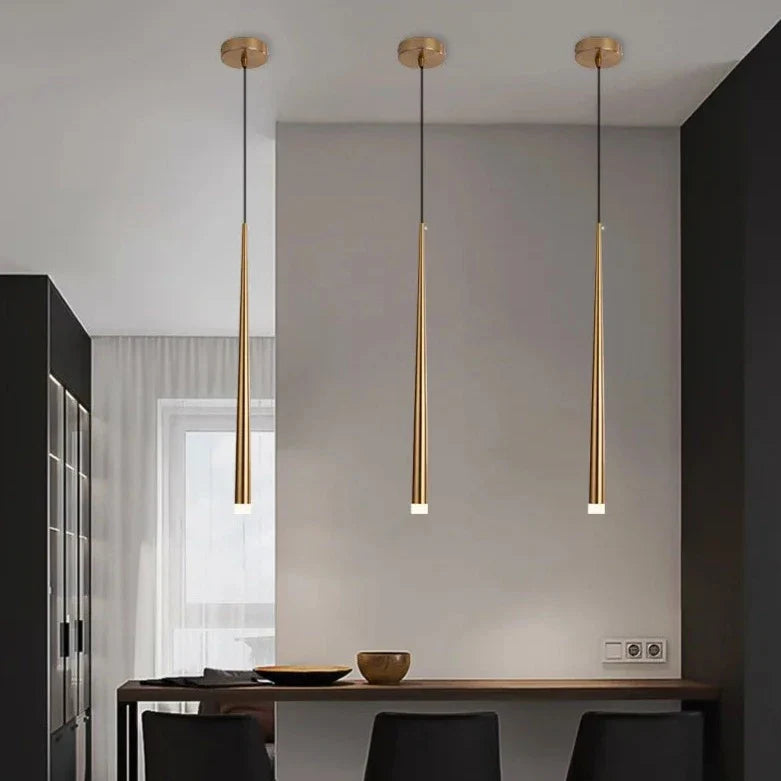 Sleek LED Drop Pendant Light by Light My House with adjustable height and warm lighting, hanging from the ceiling.