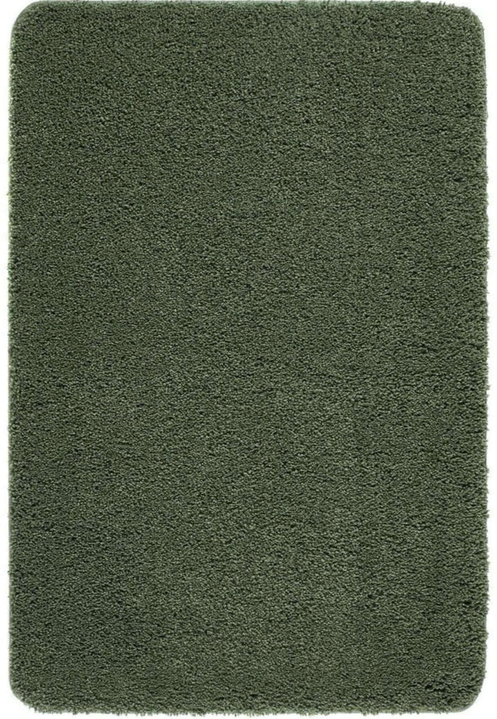 Washable Forest Green Shaggy Rug shown in an illustrative room