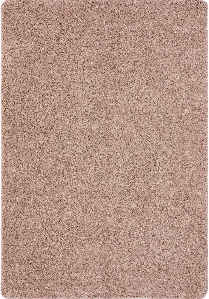 Washable Nude Pink Shaggy Rug shown in an illustrative room
