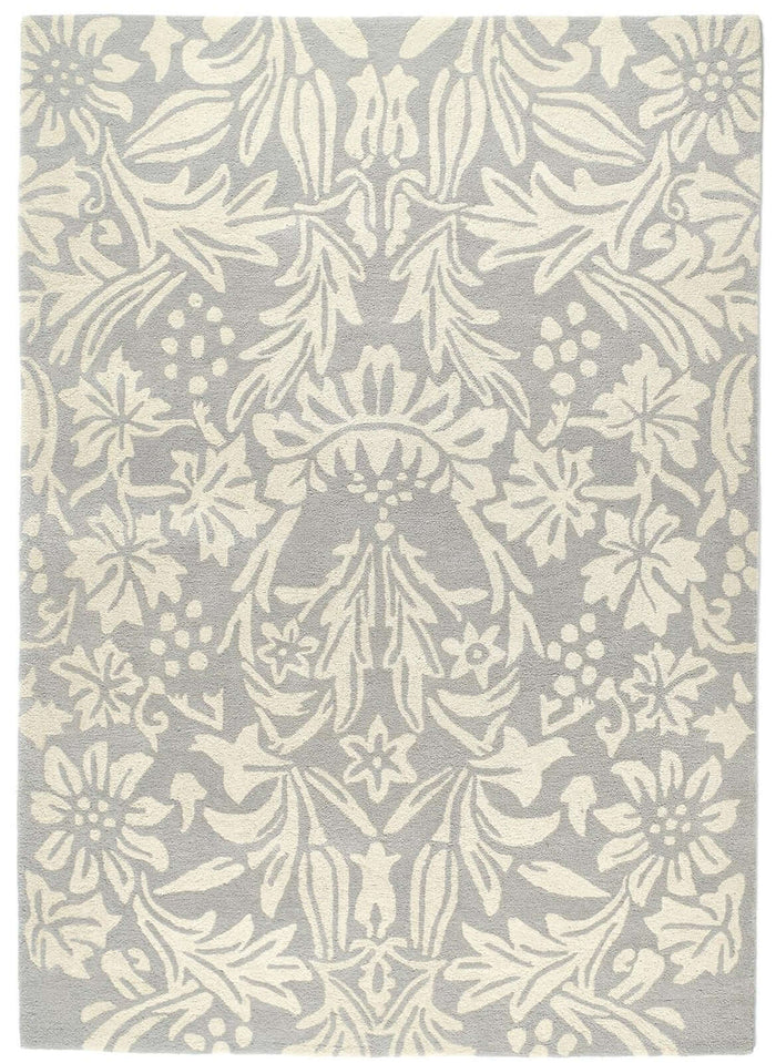 Heritage Lavender Floral Wool Rug shown in an illustrative room