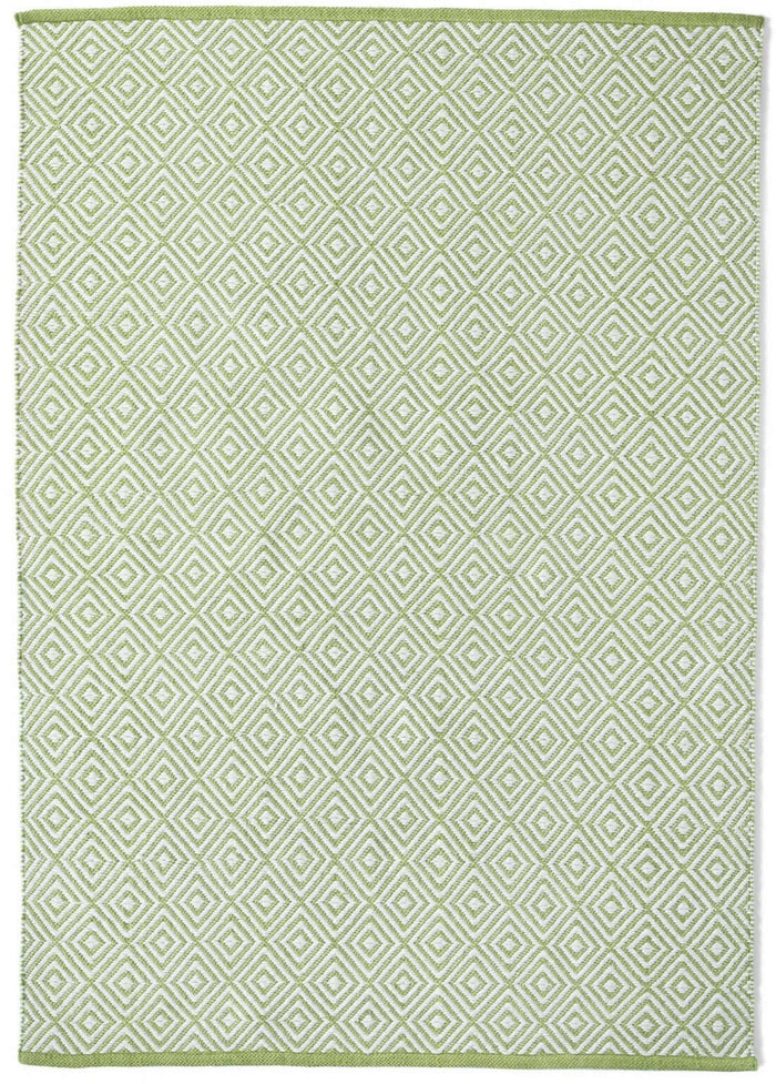Diamond Green Hand-woven Rug shown in an illustrative room