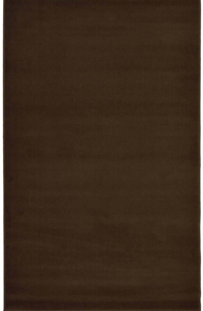 Maestro Solid Brown Rug shown in an illustrative room