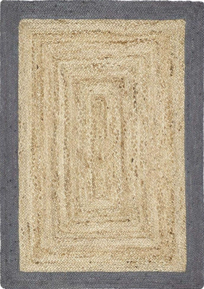 Bordered Grey Jute Rug shown in an illustrative room