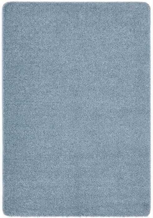 Washable Blue Shaggy Rug shown in an illustrative room