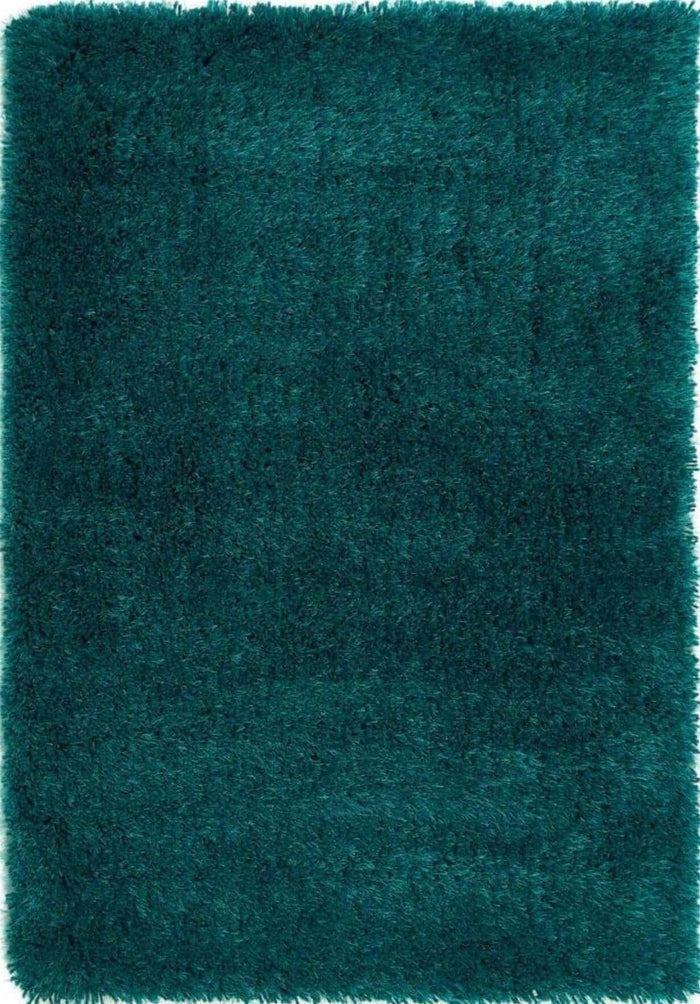 Chicago Dark Teal Shaggy Rug shown in an illustrative room