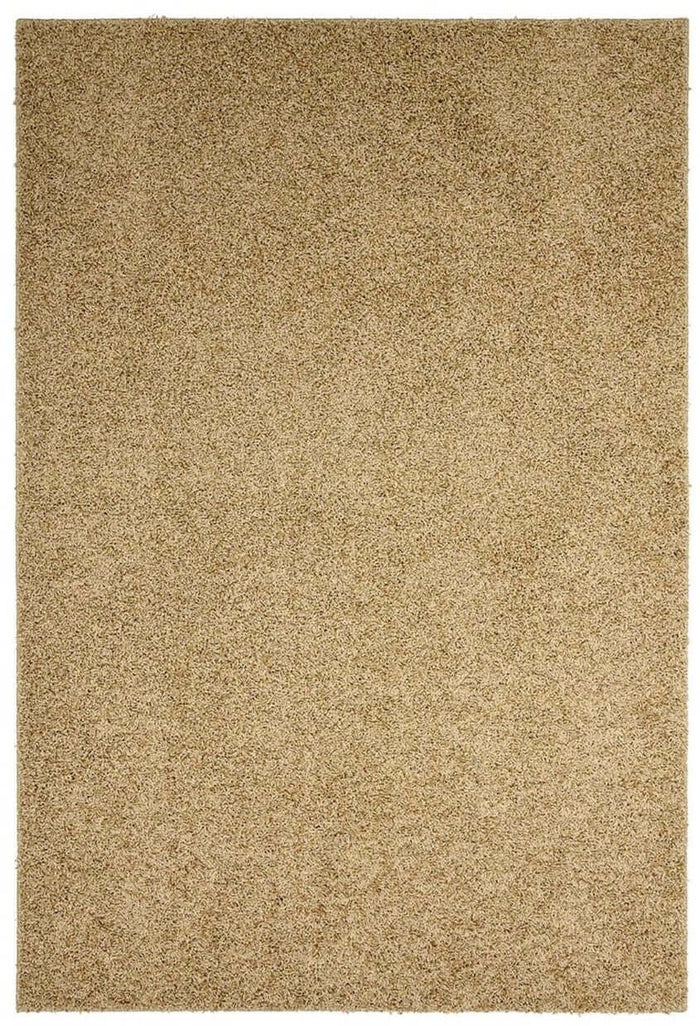 Fiji Latte Beige Washable Solid Shaggy Rug shown in an illustrative room